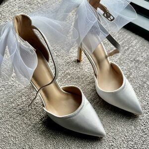 Elegant White Stiletto Heels with Bow